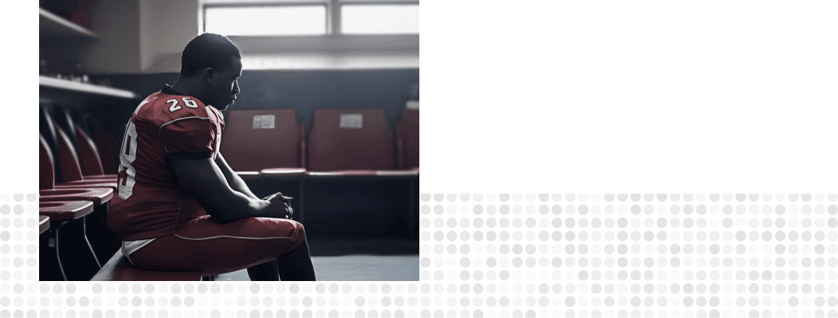 A football player sitting in a chair 